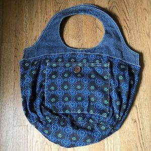 Denim boho bag with snap closure.
